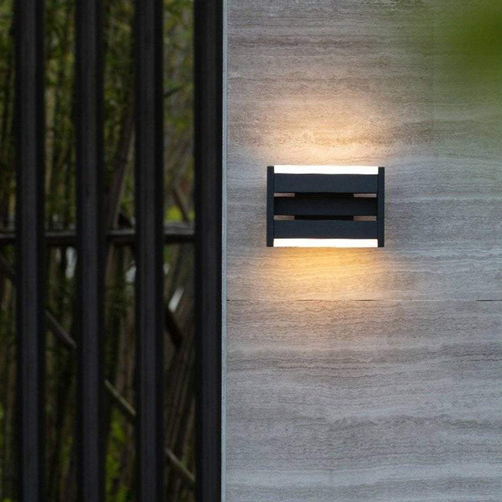 Orr outdoor wall lamp lit at night
