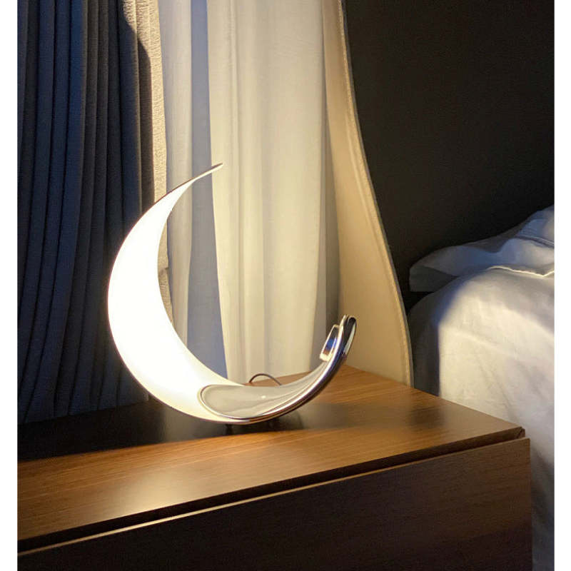 Elif Moon Arc Table Lamp on a nightstand