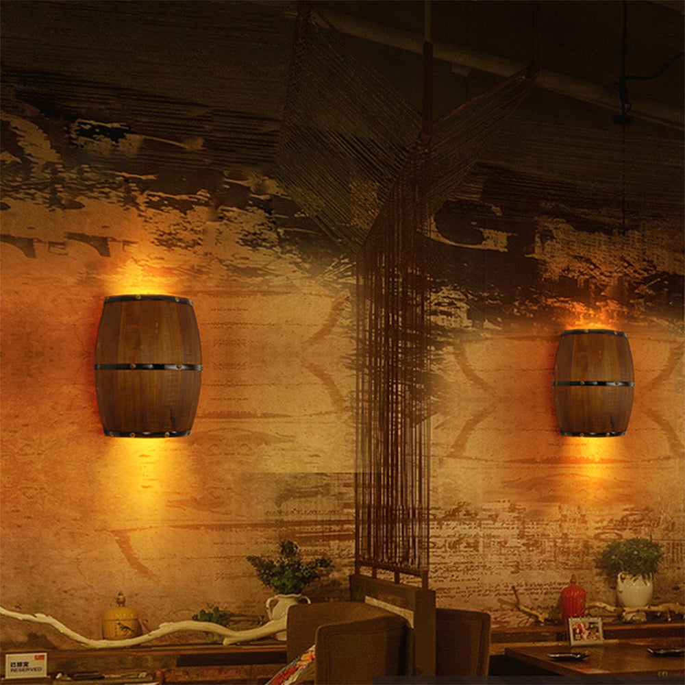 Alessio barrel wall lamp in dining room